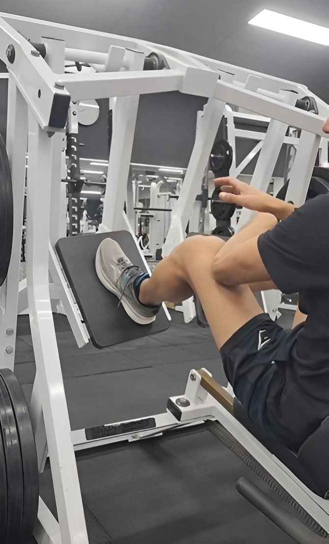 Person using a leg press machine in a gym —True Form Fitness In Gwandalan, NSW