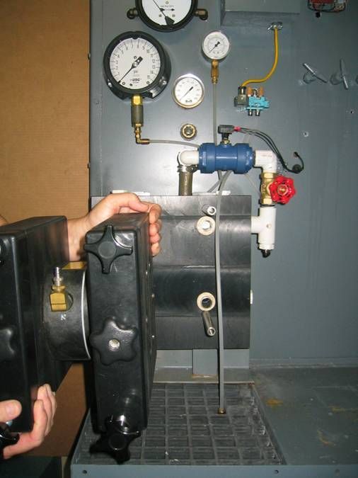 Step 3: Remove the pump from the area and set it aside for maintenance (10 seconds)