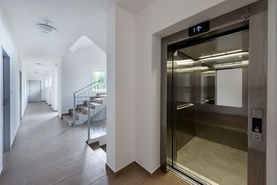 Modern hallway with an open elevator