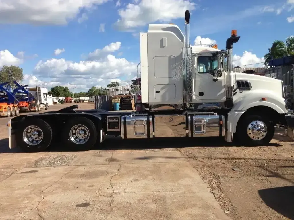 A White Truck is Parked on the Side of the Road — JEC Transport in Winnellie, NT