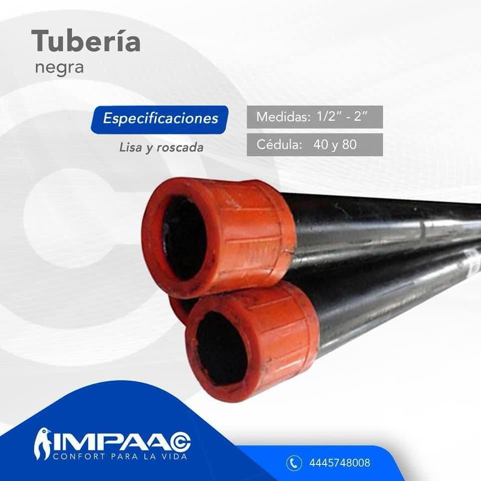 Tubos de acero negro con tapas rojas en los extremos, con especificaciones de medidas (1/2