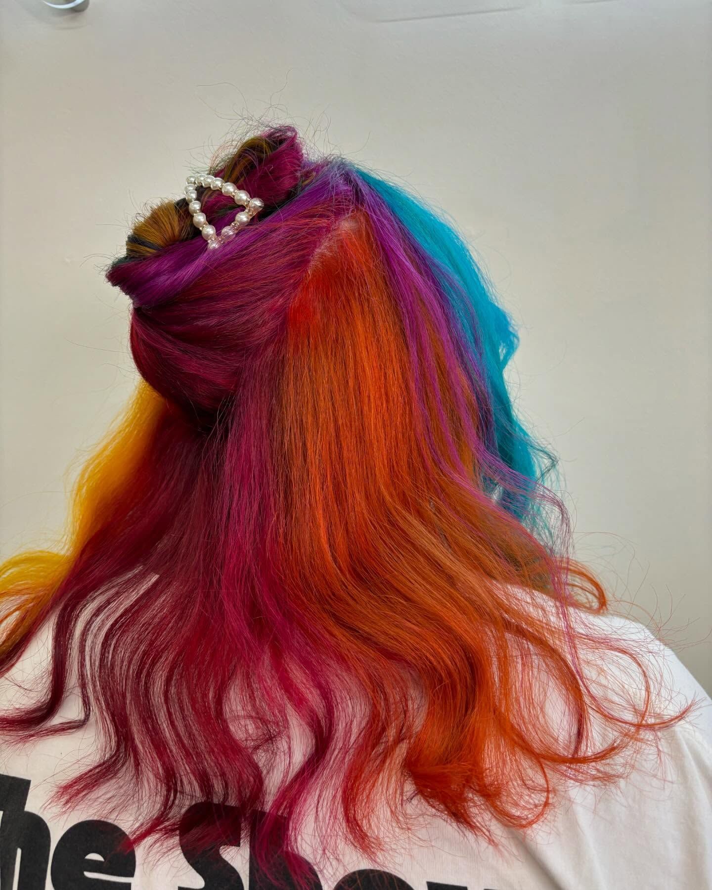Back View of a Person With Bright Rainbow-dyed Hair — Hair Truss & Co In Wallsend, NSW