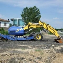 Escavatore giallo e blu 