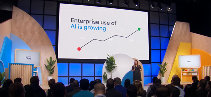 A presentation on stage that reads 