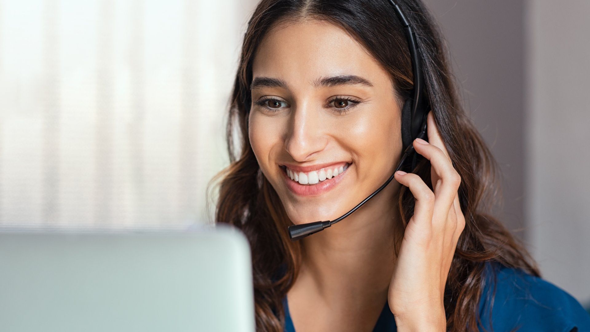 Women speaking to a customer on the phone in a contact centre