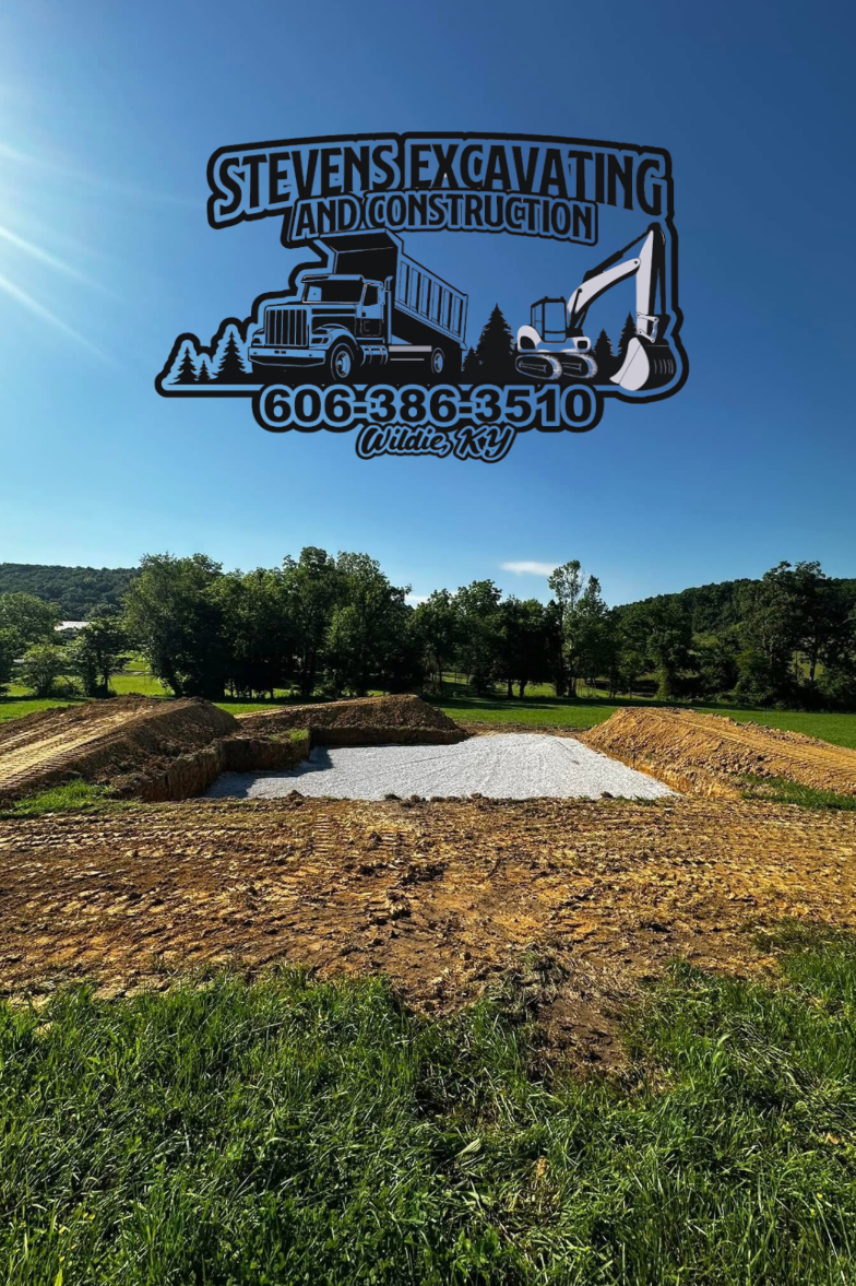Dirt work with Stevens Excavating logo, phone number, and blue sky background.