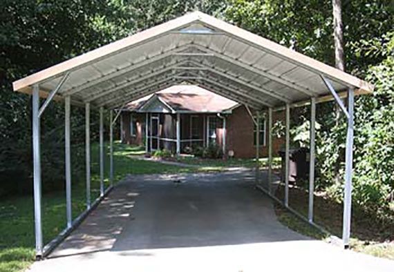 A carport with a blue roof and a white frame on a white background.