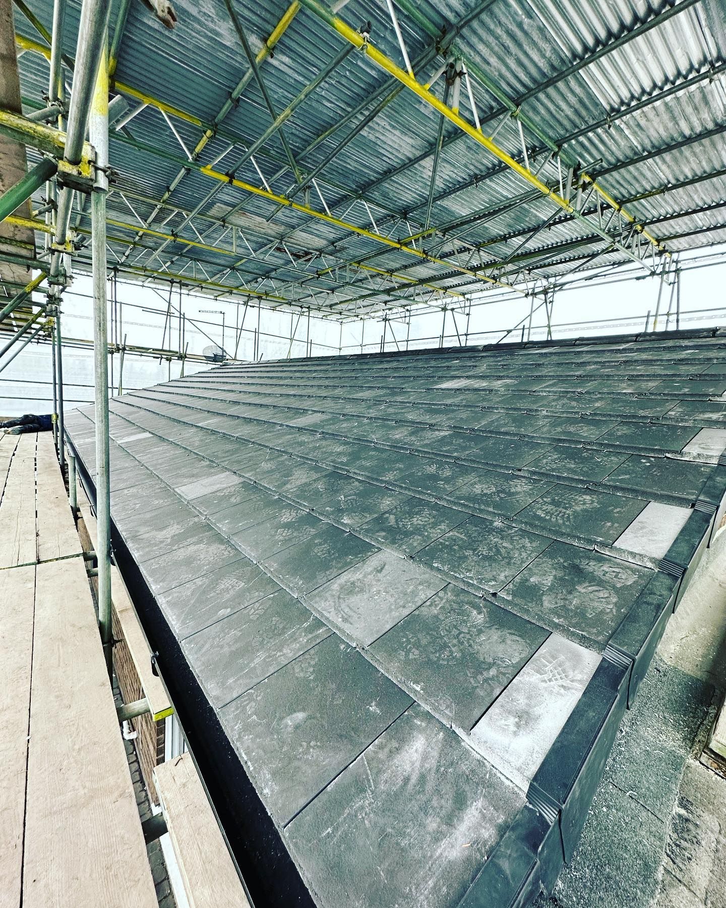 A picture of a slate roof replacement carried out by Roofers Barnsley