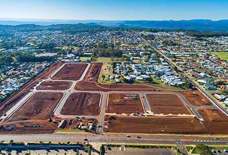 an aerial view of a residential area under construction in a city