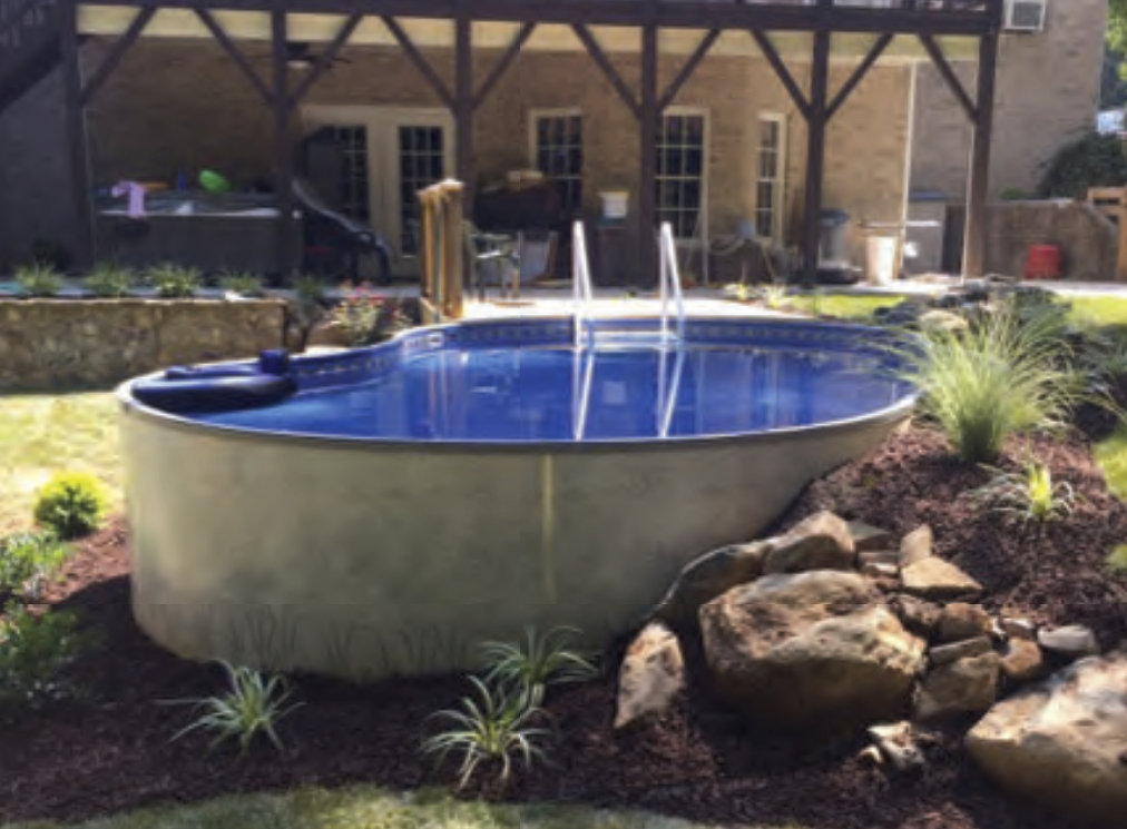 Above-ground pool by Jelly Belly's Pools & Spas