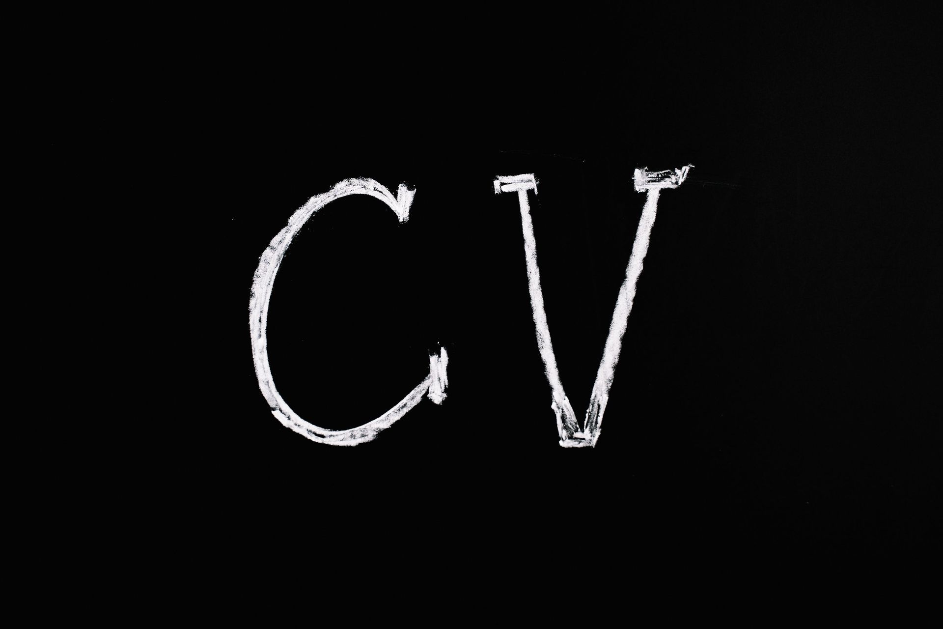Image depicting the letters C V, as though written on a chalkboard.