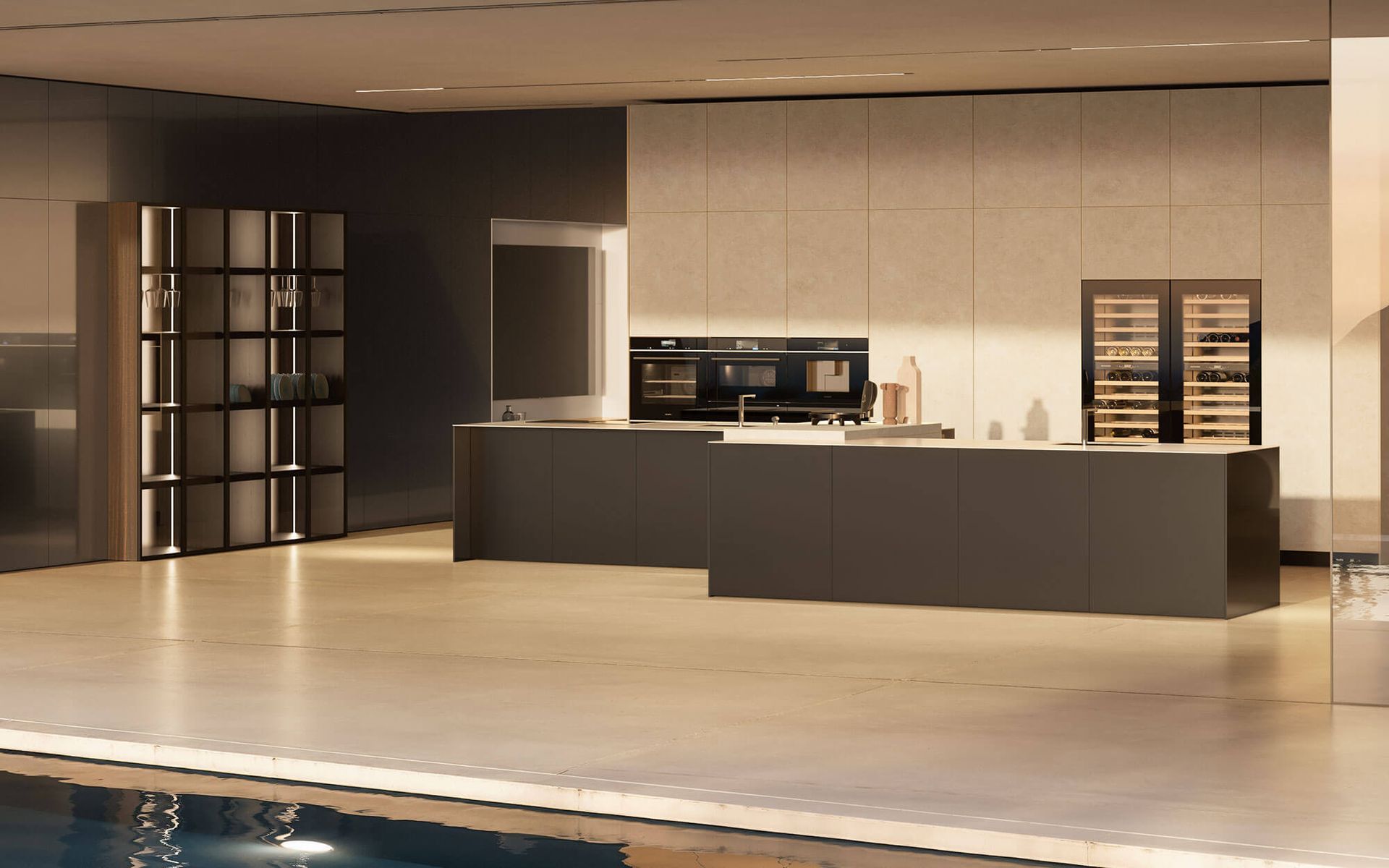 Una cucina con una grande isola e una piscina sullo sfondo.