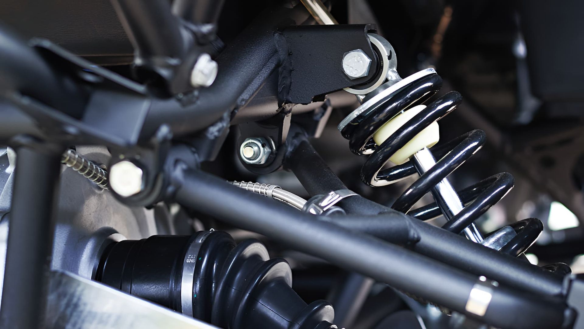 A Close Up Of A Shock Absorber On A Vehicle — Berry Automotive Repairs In Berry, NSW
