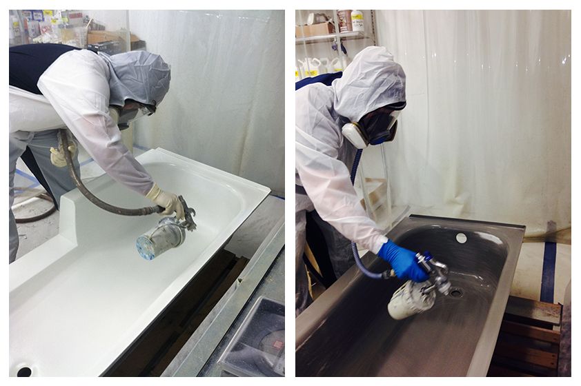 A man in a protective suit is spray painting a bathtub.
