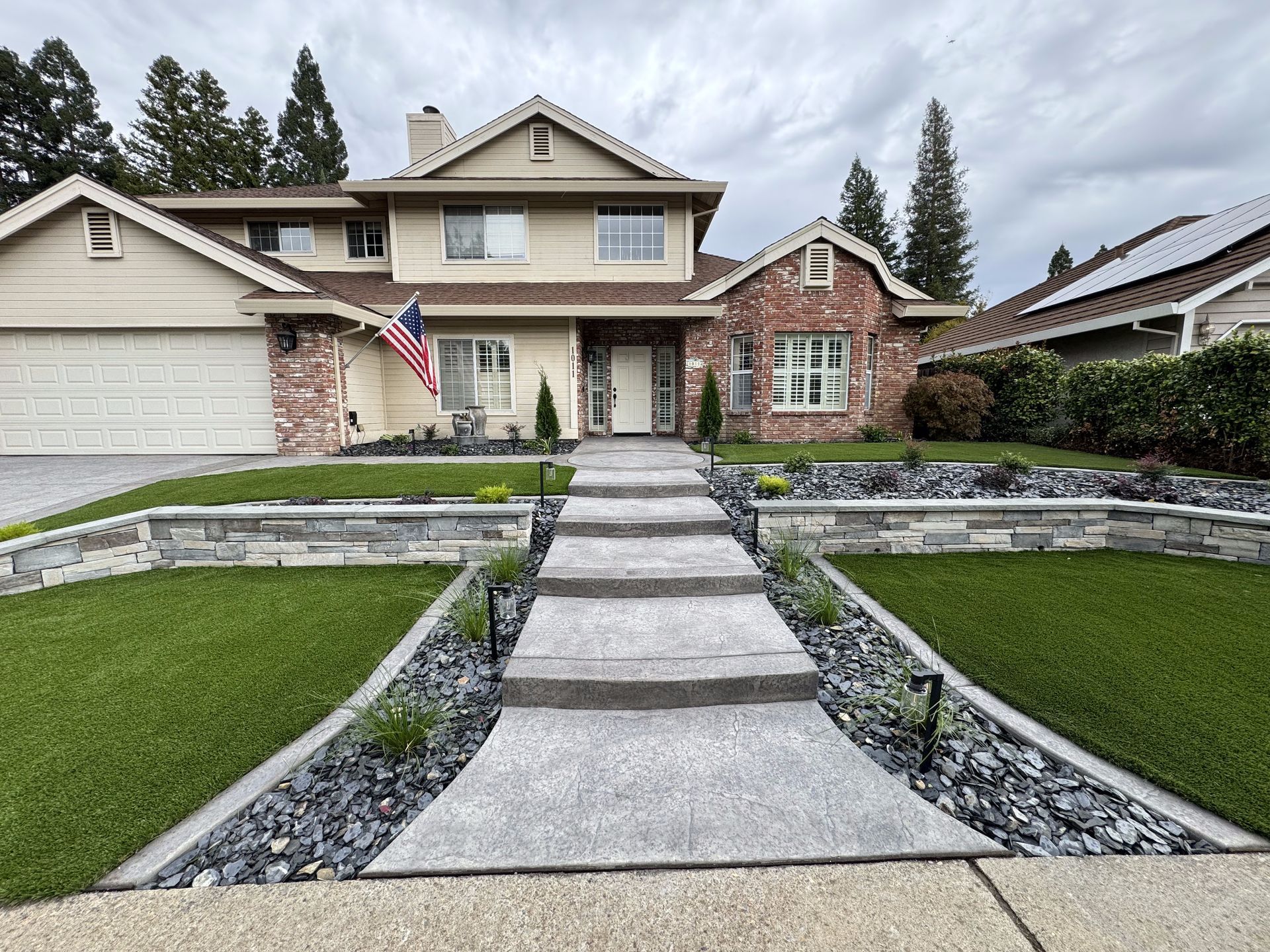 A large house with a walkway leading to it