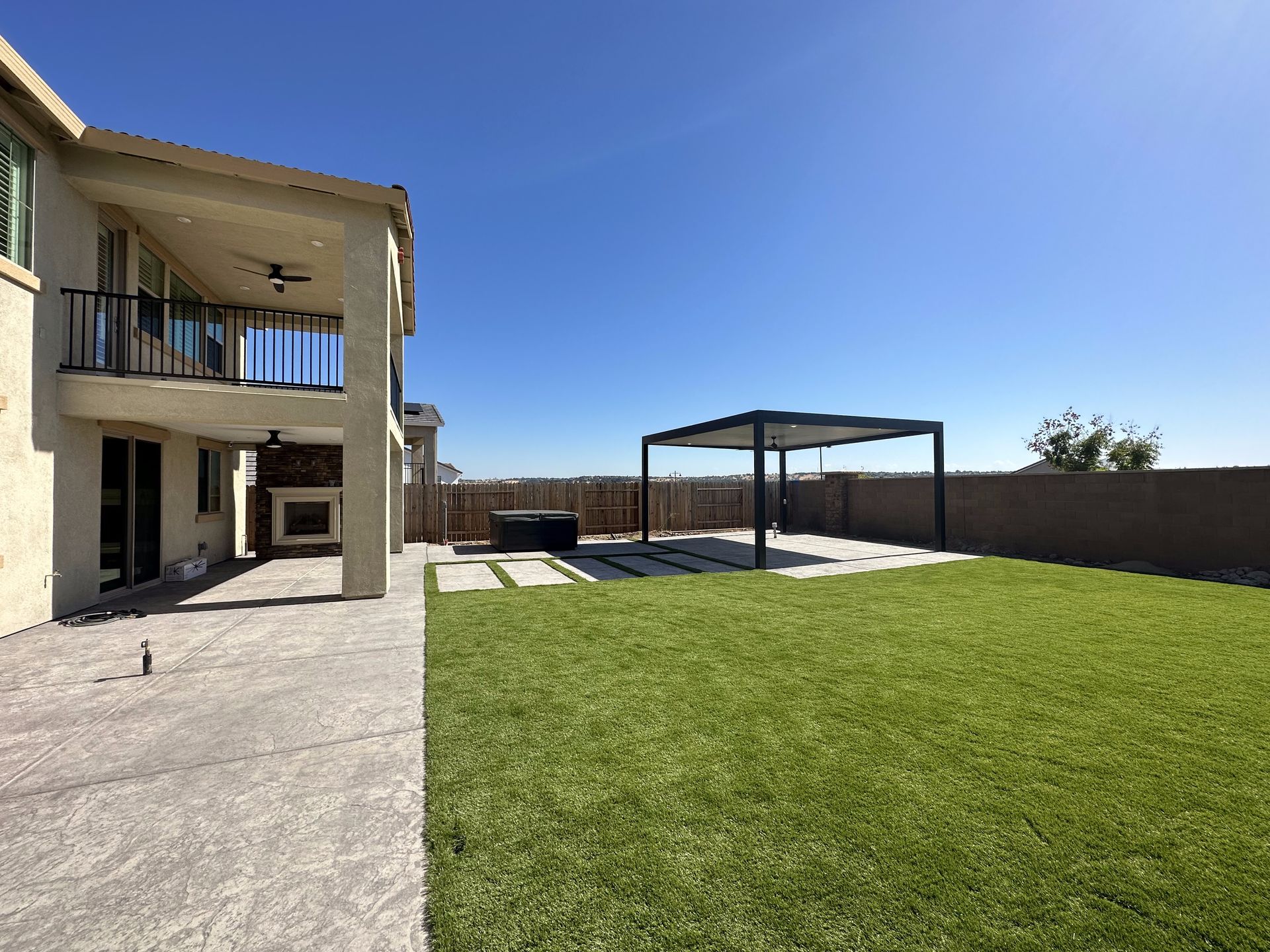 A large house with a large lawn in front of it