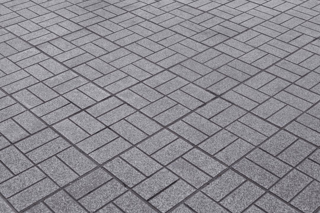 White Car on Driveway — Adelaide, SA — Playford Pavers