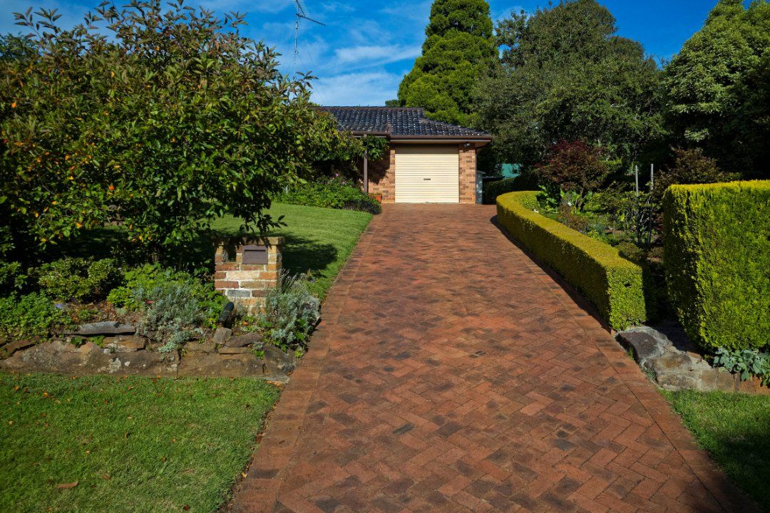 White Car on Driveway — Adelaide, SA — Playford Pavers