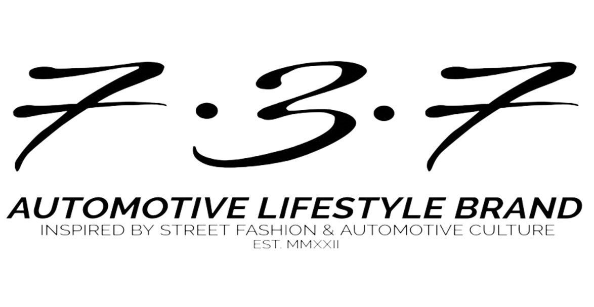 7.3.7 automotive lifestyle brand logo with stylized black lettering and tagline on white background