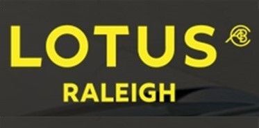 Yellow “LOTUS” logo with “RALEIGH” beneath it on a dark background.
