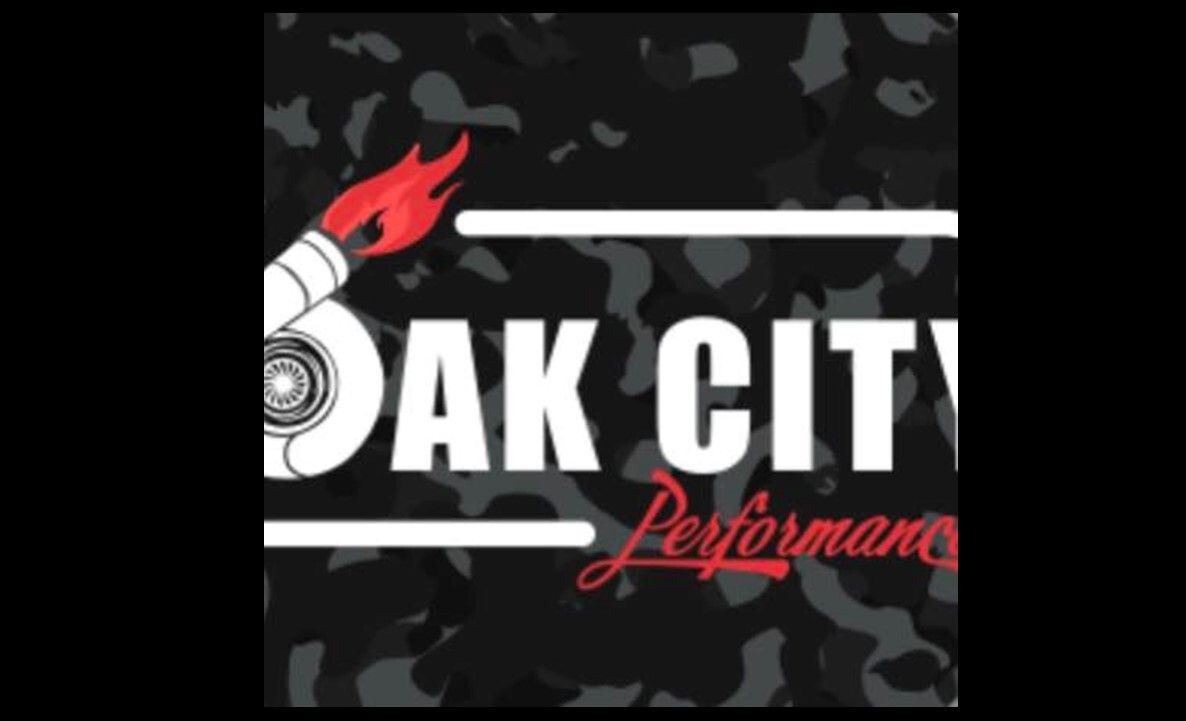 Oak City Performance logo in white and red on a dark camouflage background