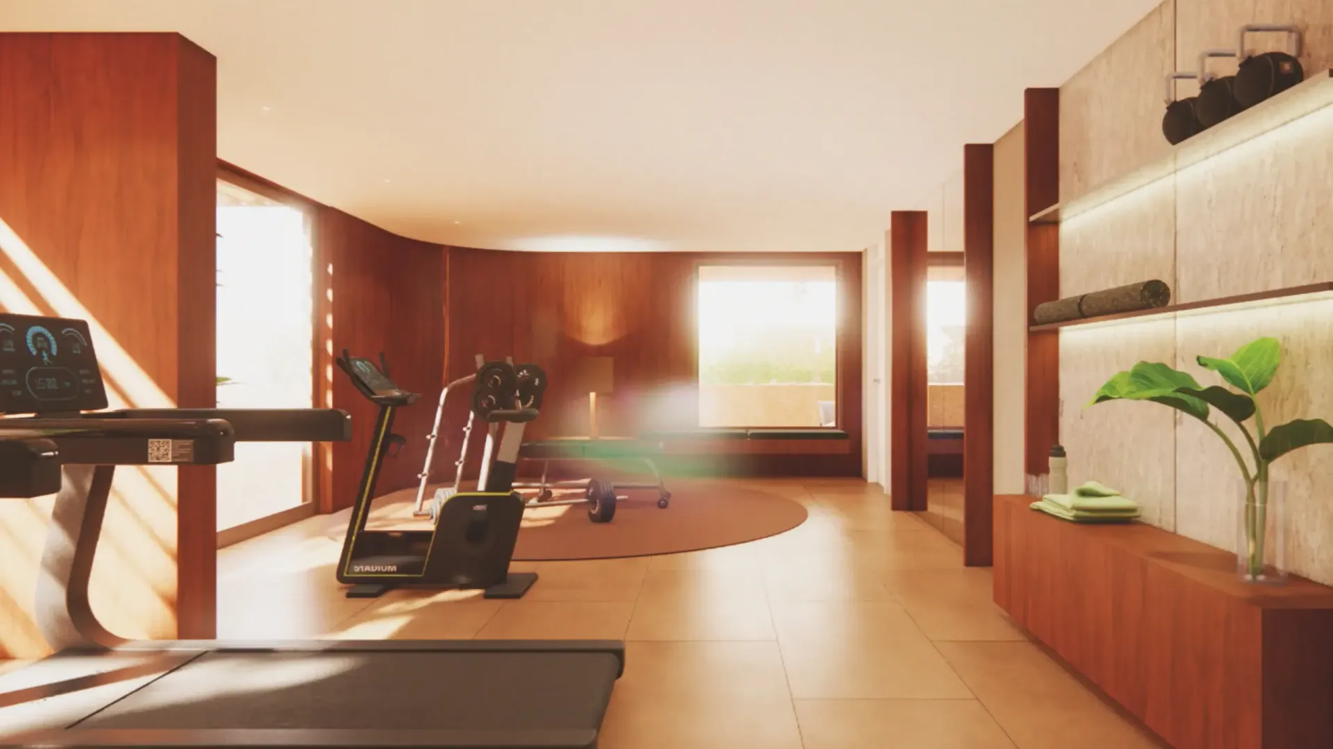 Academia moderna em casa com esteiras, pesos e equipamentos de ginástica, em piso de madeira e azulejo.