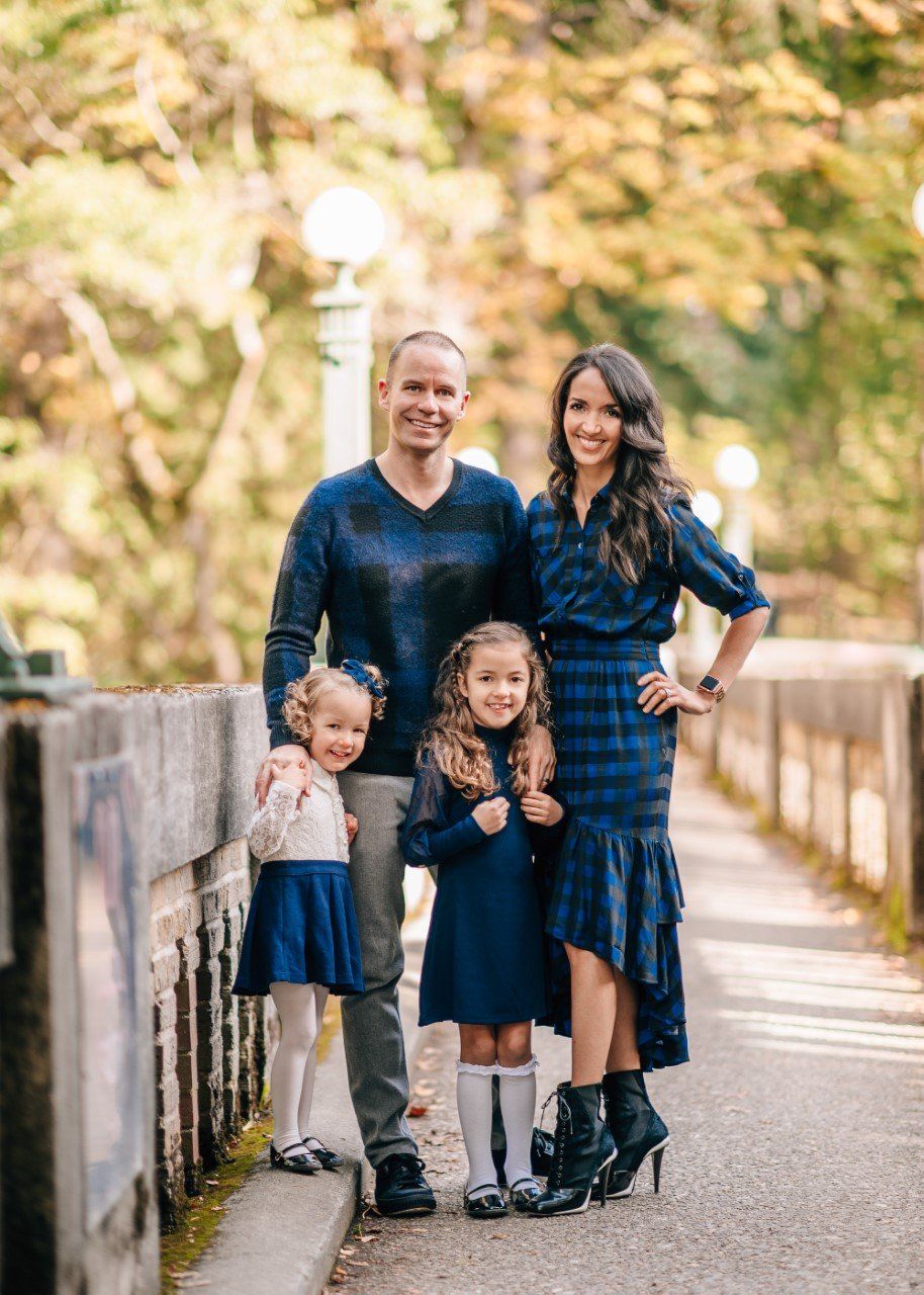 Dr. Stahl, dentist in Bellevue, smiling for a picture with his family.