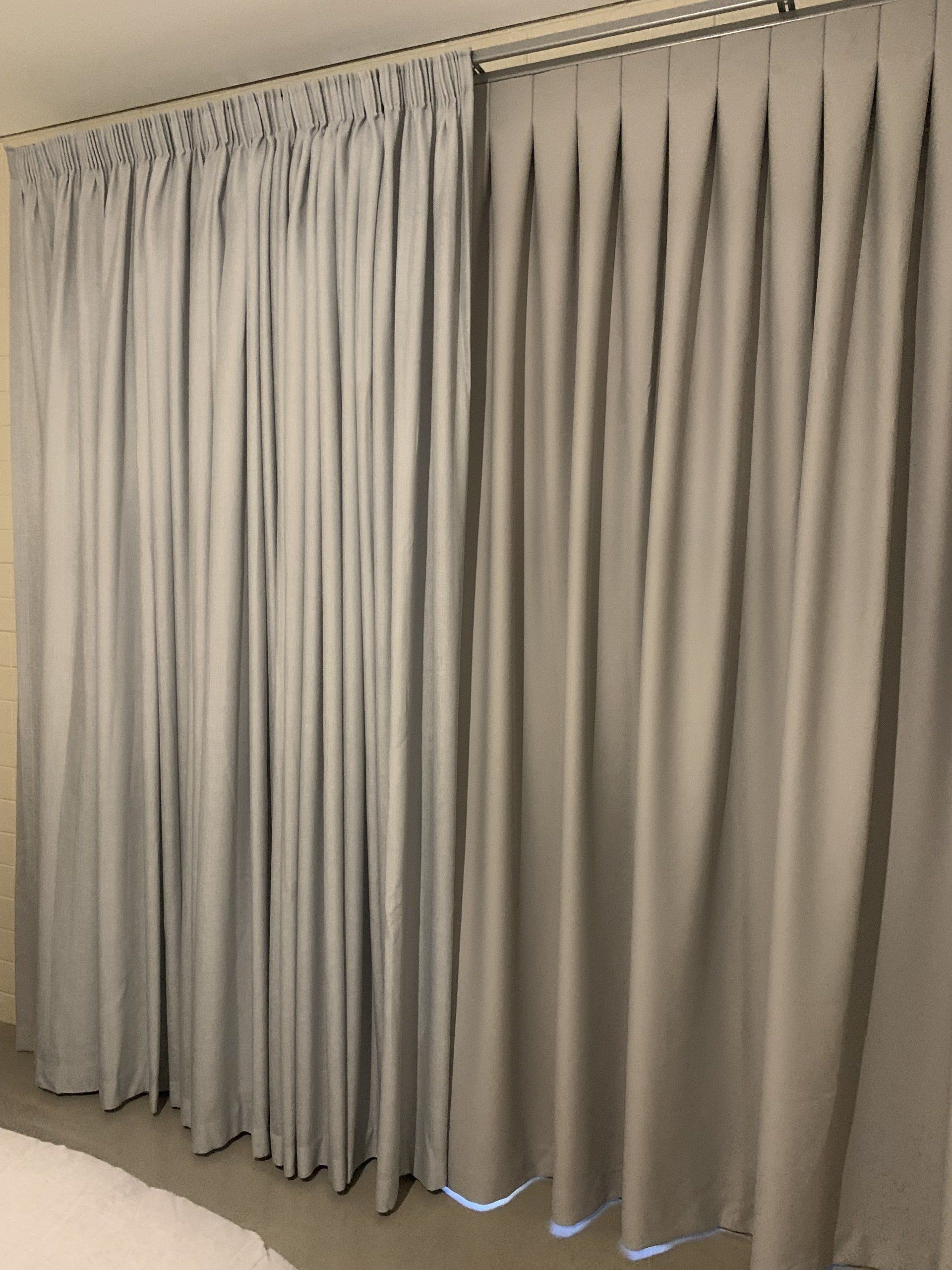 Grey Pleated Curtains Hung from A Rod — Alice Mobile Blinds in Ciccone, NT
