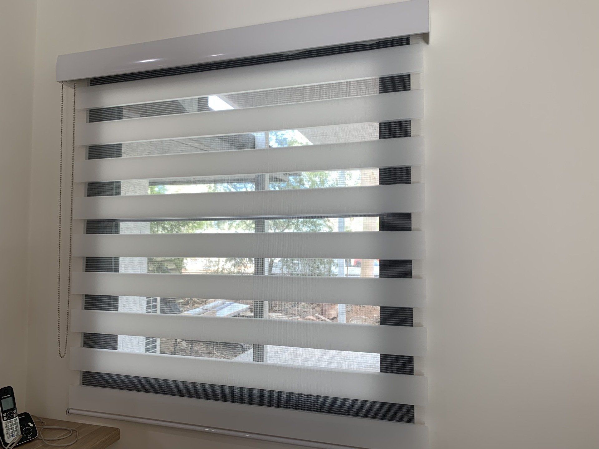 Window with Striped Zebra Blinds Alternating Opaque — Alice Mobile Blinds in Ciccone, NT