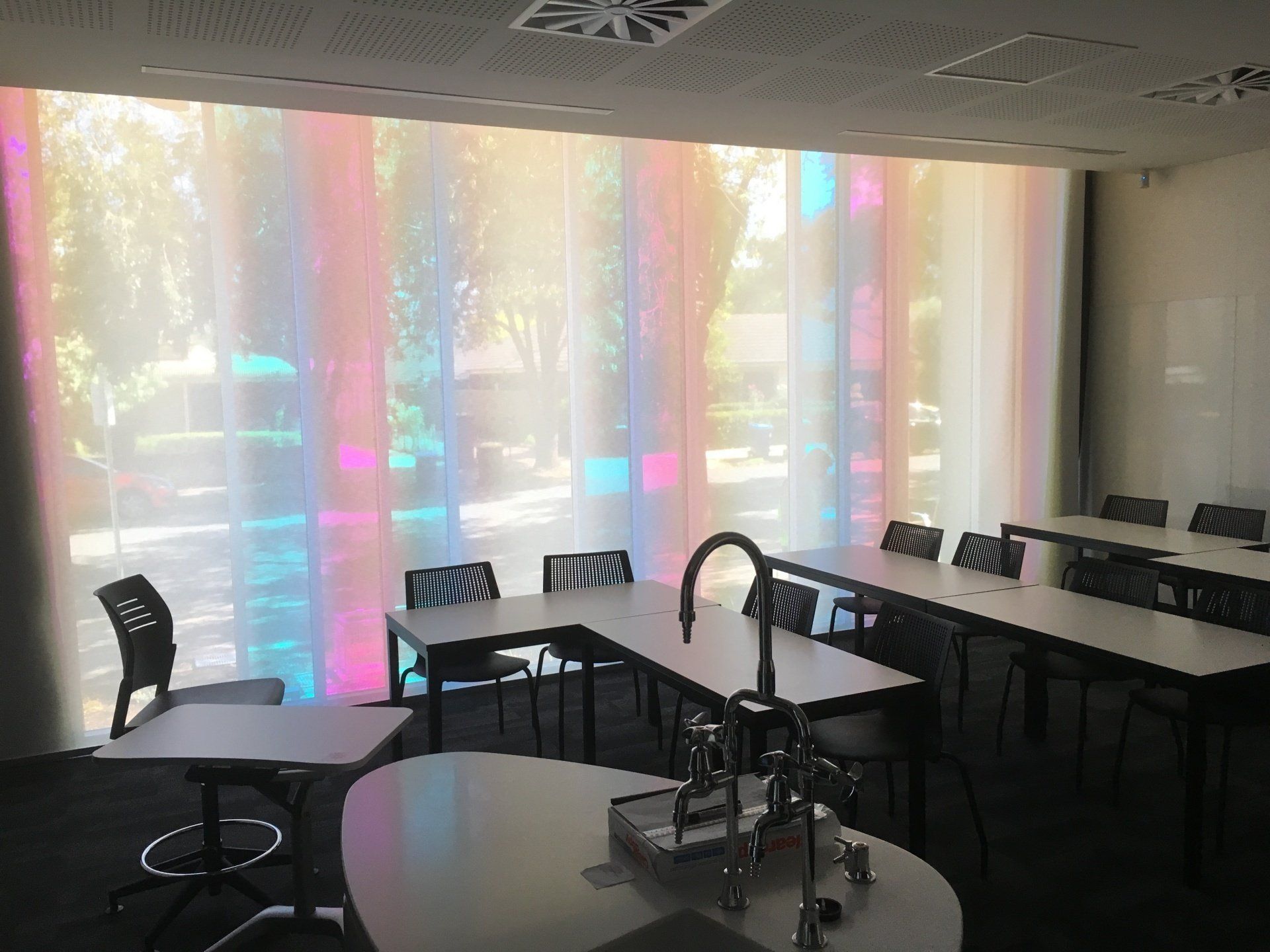 Classroom with Colourful Window Panels and Lab Tables — Alice Mobile Blinds in Ciccone, NT