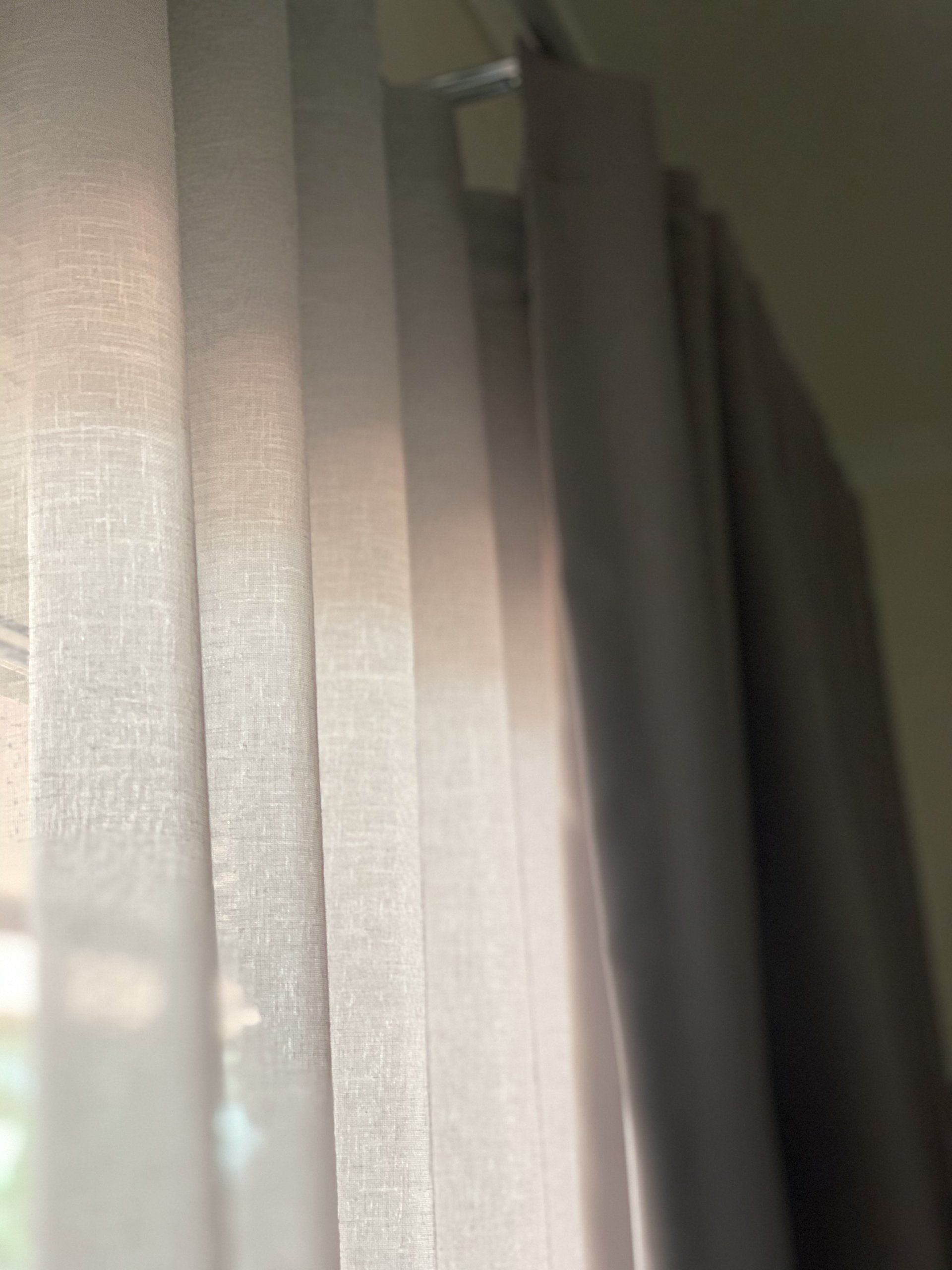 Beige and Grey Curtains Hanging on A Silver Rod — Alice Mobile Blinds in Ciccone, NT