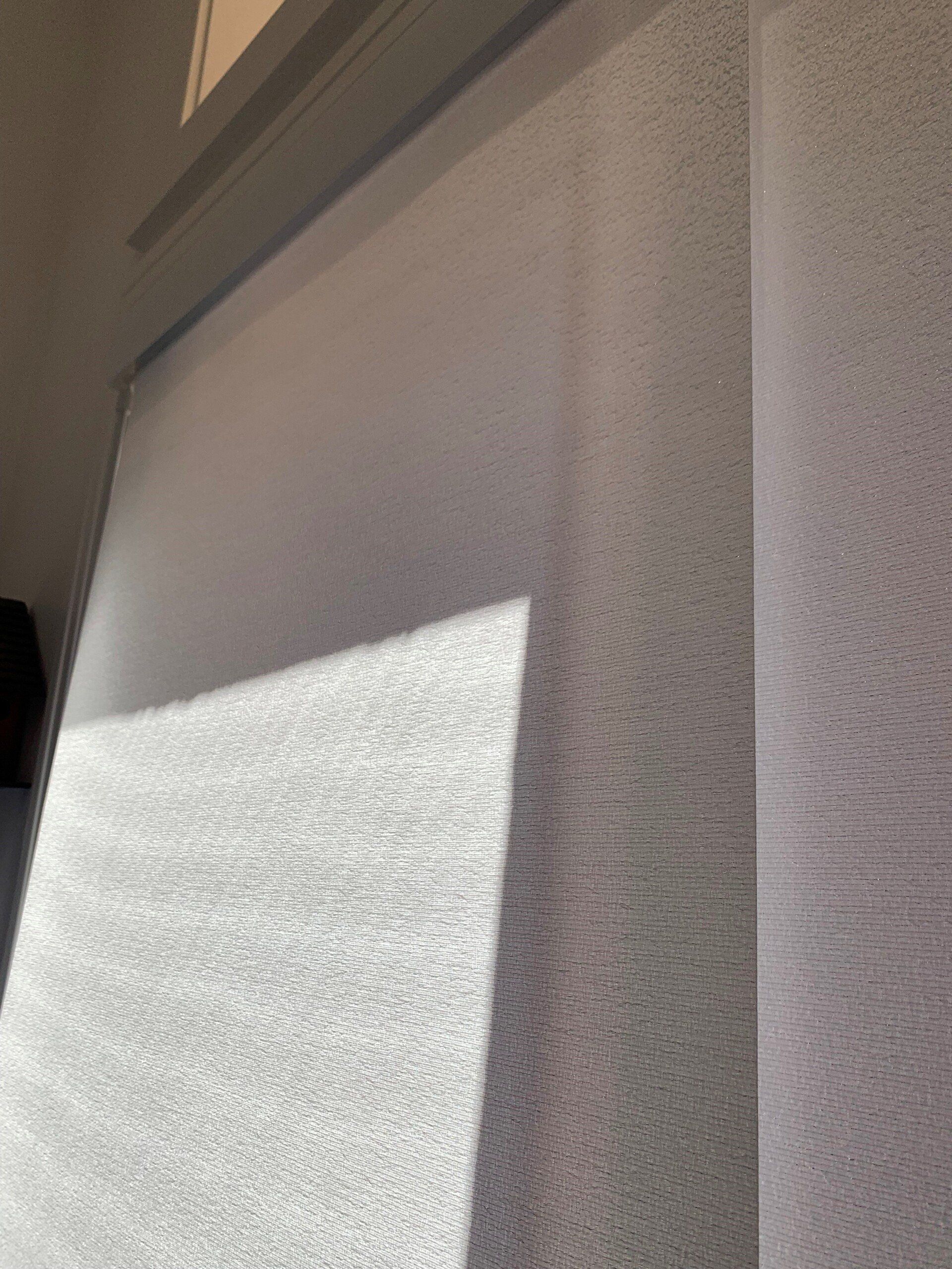 Sunlight Casting a Shadow on A White — Alice Mobile Blinds in Ciccone, NT