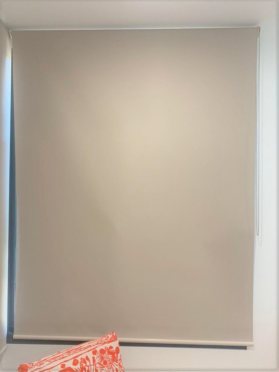 Closed Beige Roller Blind in A White Window Frame — Alice Mobile Blinds in Ciccone, NT