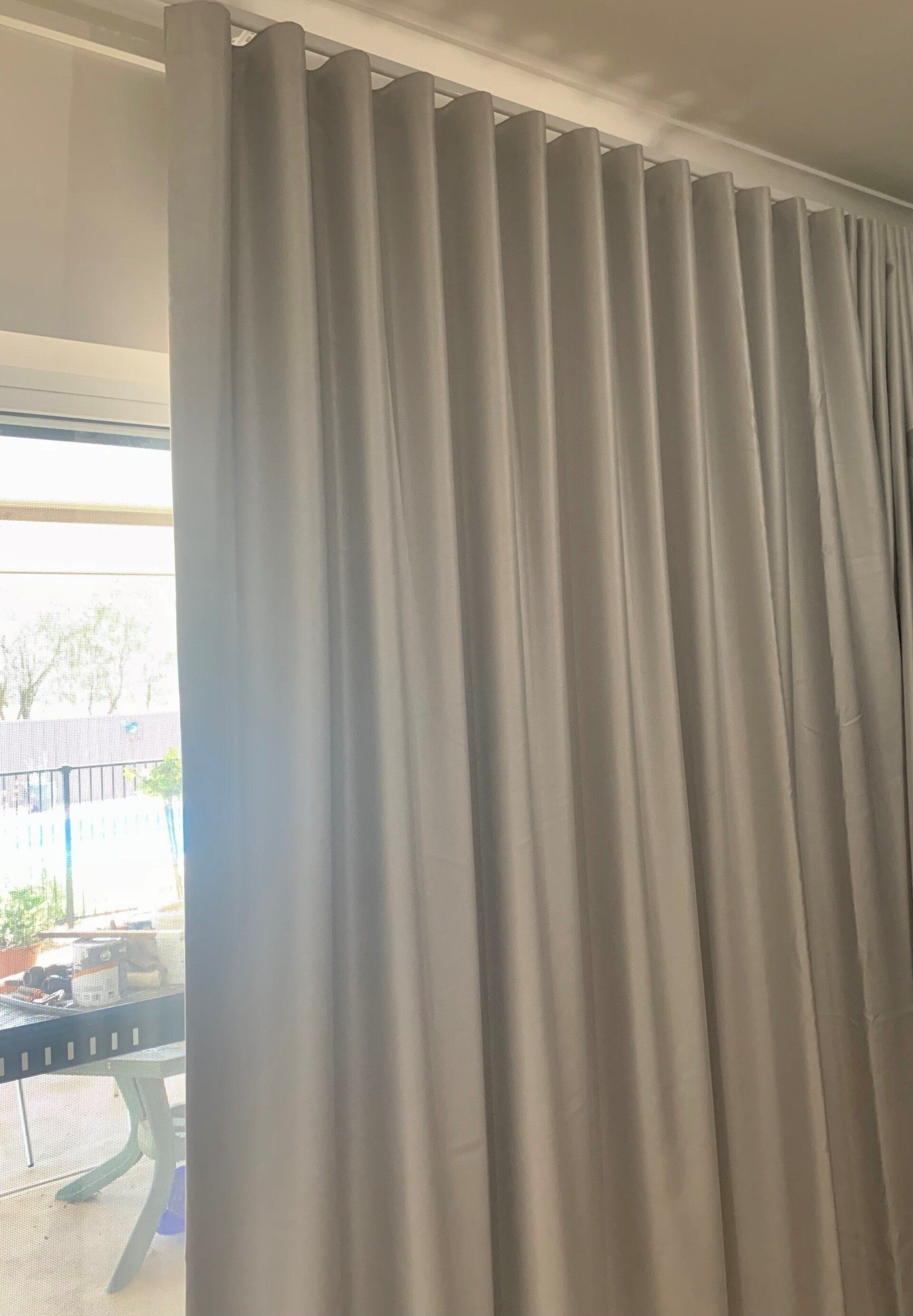 White Curtain Hanging in Front of A Window — Alice Mobile Blinds in Ciccone, NT