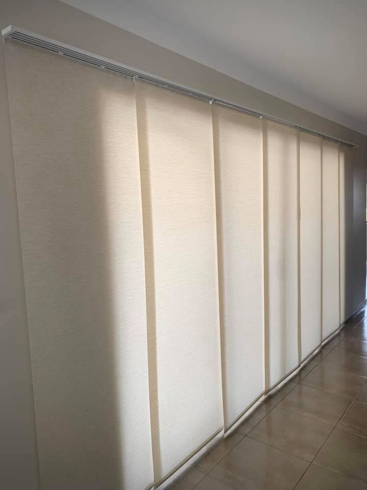 Off-White Vertical Blinds Covering a Large Window — Alice Mobile Blinds in Ciccone, NT