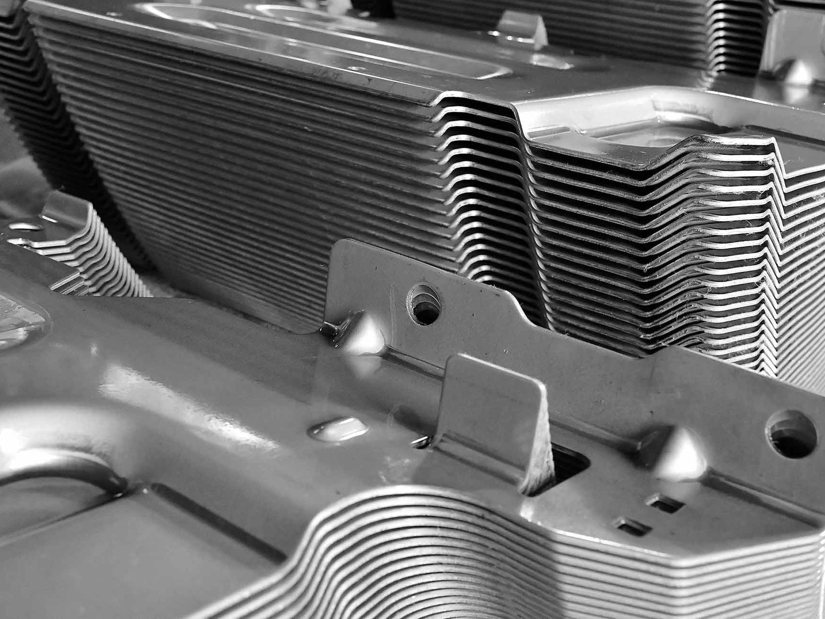 A photo of a stack of metal plates