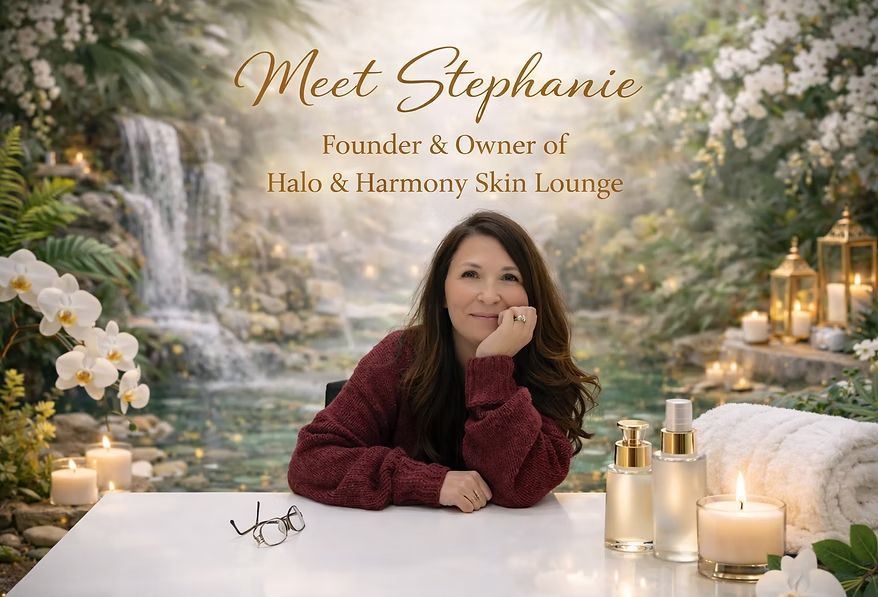 Portrait of Stephanie at a skincare table in a floral garden setting, with candles and golden bottles nearby