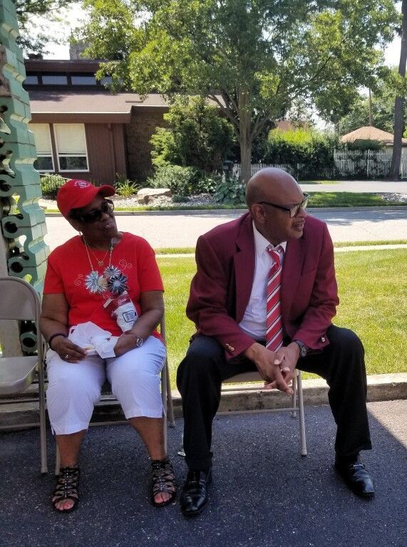 A man and a woman are sitting next to each other