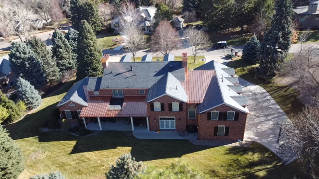 High-quality asphalt shingles for residential properties by Kudu Roofing.