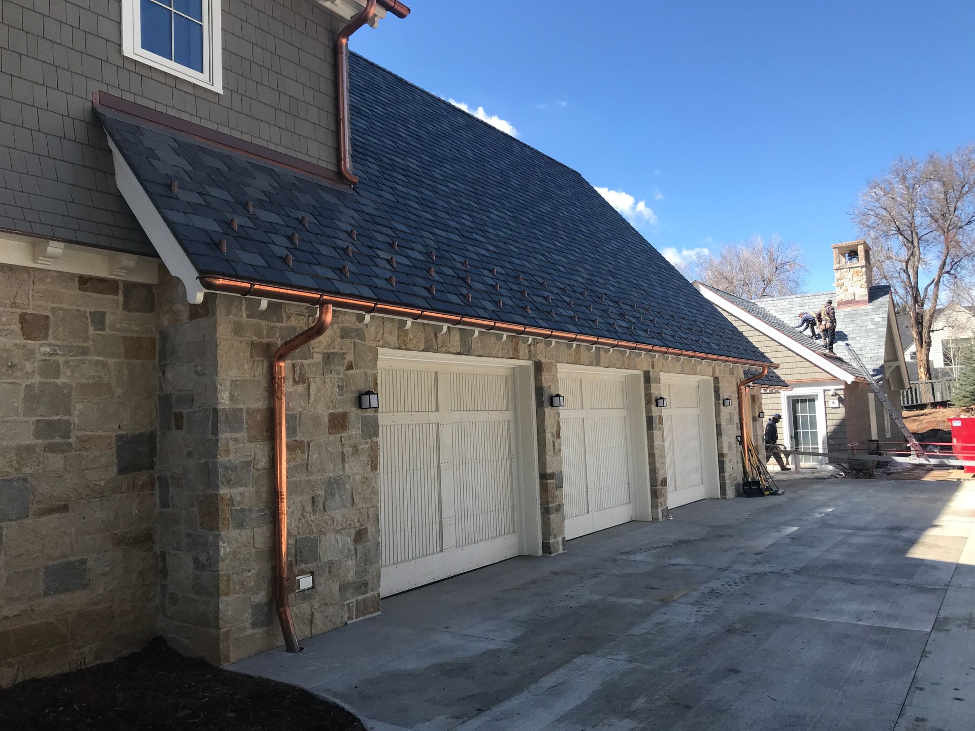 Trim and gutter installation by Kudu Roofing.
