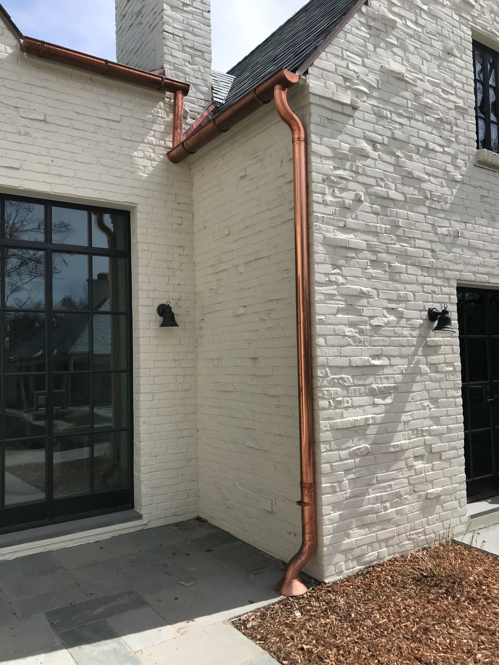 Durable gutters and trim installed by Kudu Roofing.