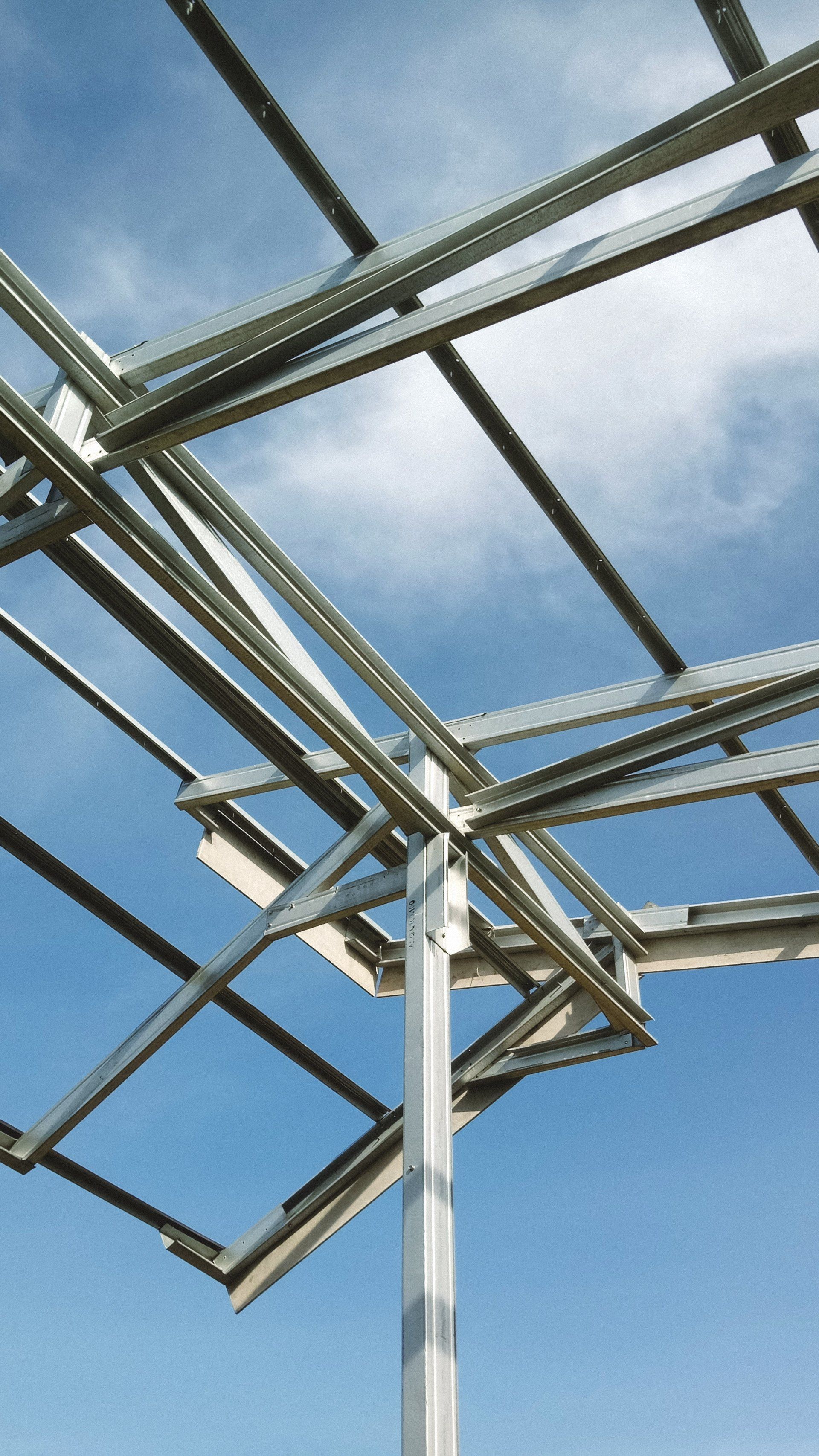 A metal structure with a blue sky in the background