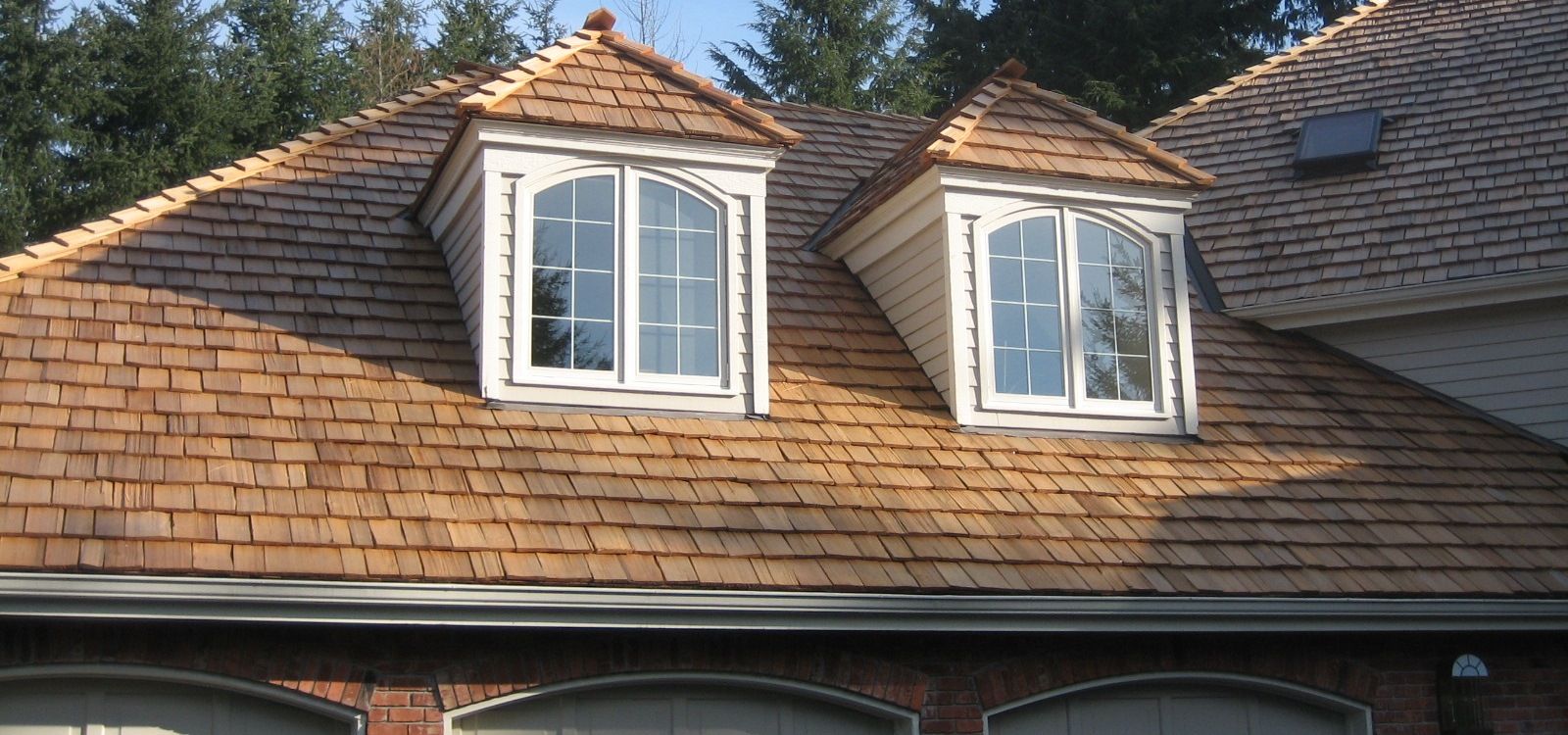 Residential wood shake roof by Kudu Roofing.