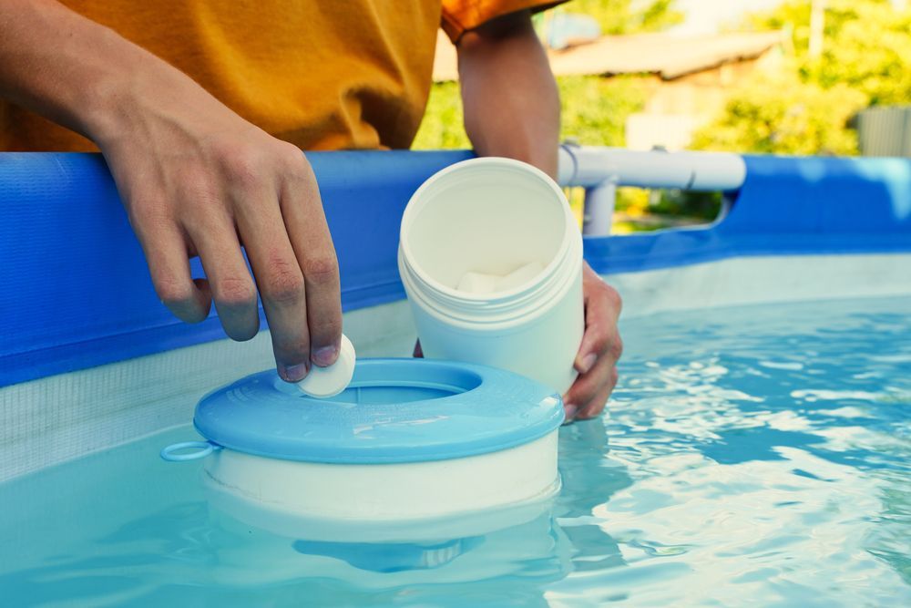 Person Testing Pool Water
