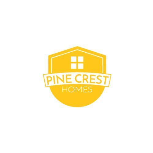 the pine crest homes logo is a yellow shield with a house on it .