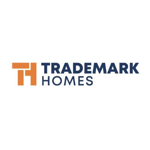 the logo for trademark homes is blue and orange on a white background .