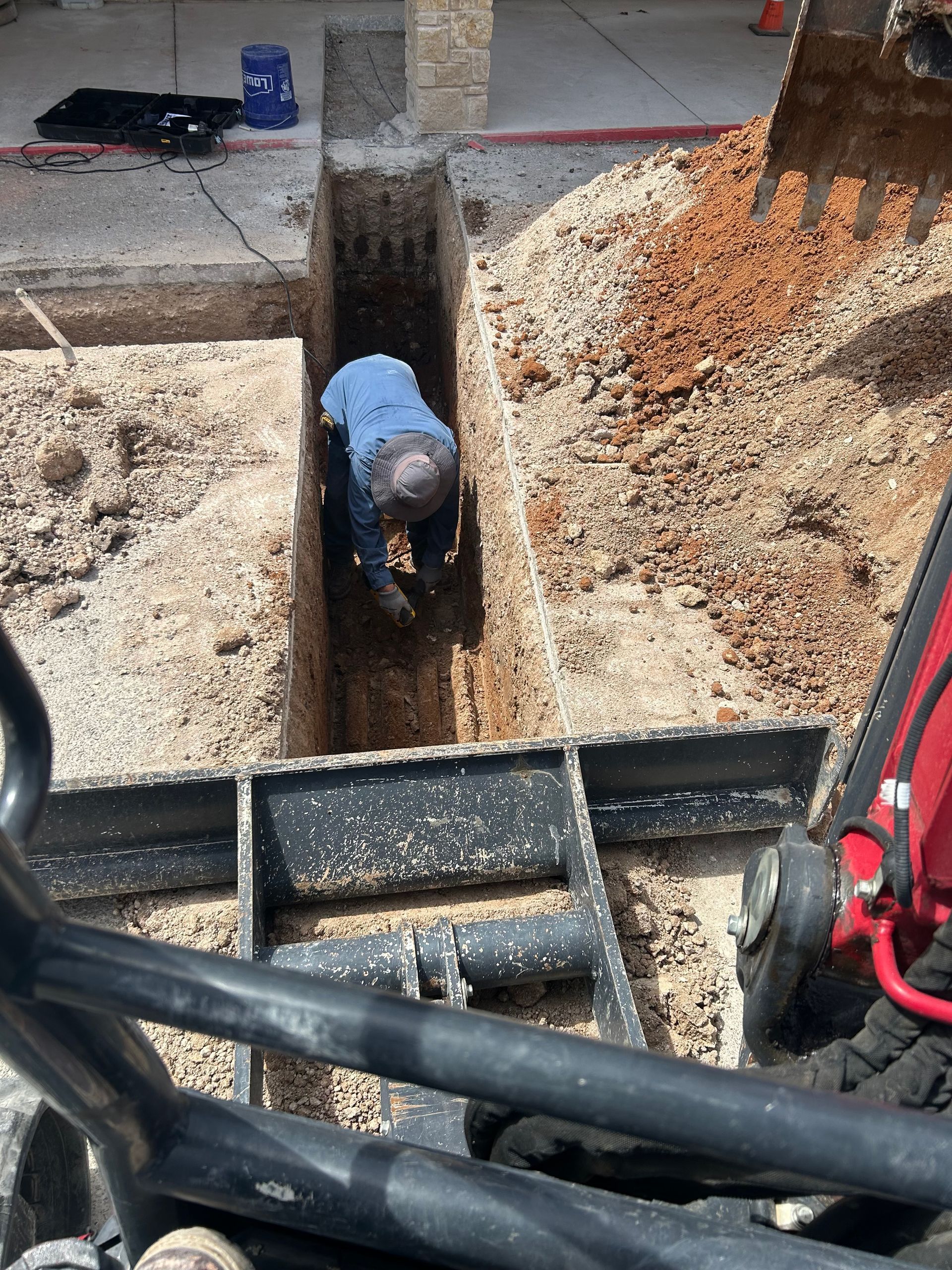 plumber connecting a pipe