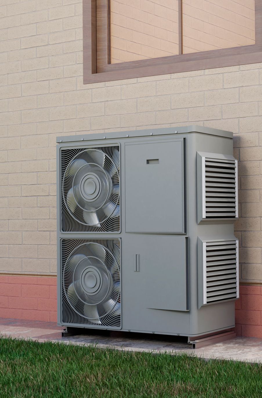Un grand climatiseur est installé sur le côté d'un bâtiment.