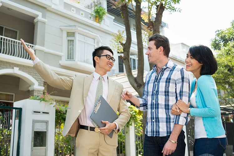 couple is shown a house