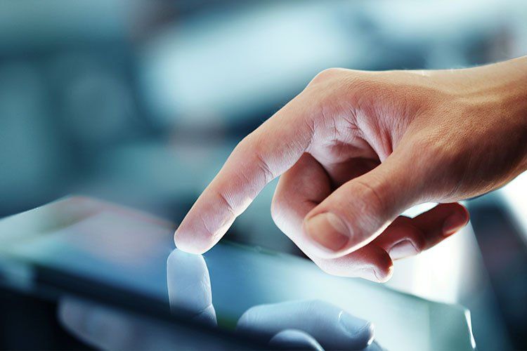 person uses touch screen